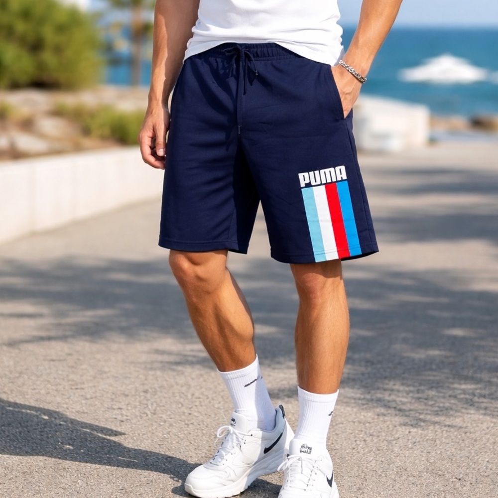 Puma men’s Celebration Shorts Peacoat Blue size Small Logo Stripe pockets NWT